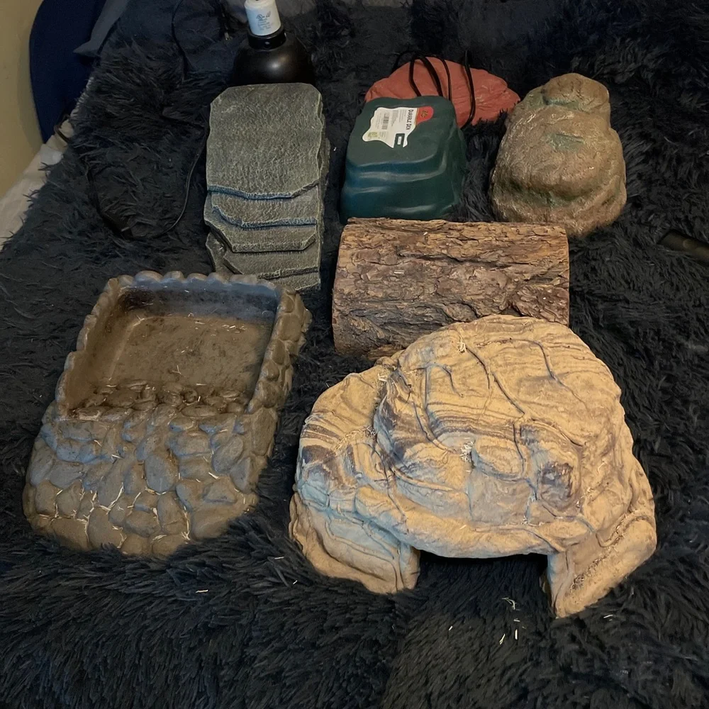 Reptile, hides ceramic hide very nice. water feeder, heat rock, heat lamp.
